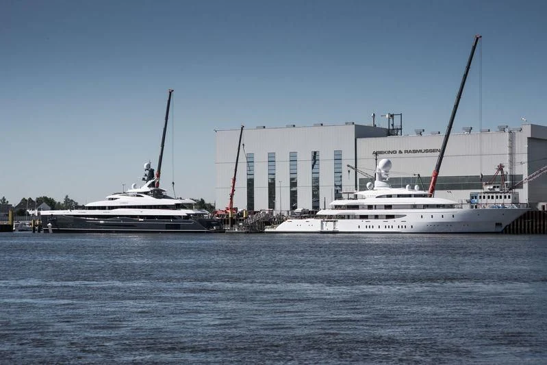 a couple of boats sit in the water aboard M'BRACE Yacht for Sale