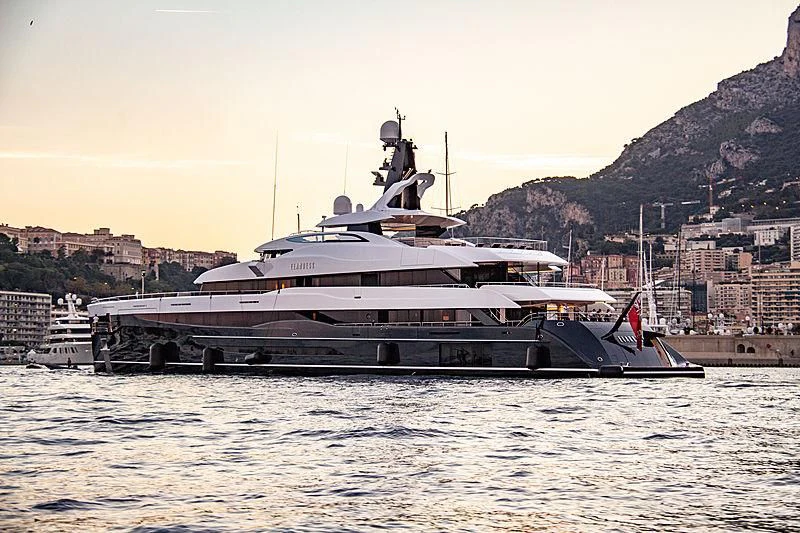 a large ship in the water aboard M'BRACE Yacht for Sale