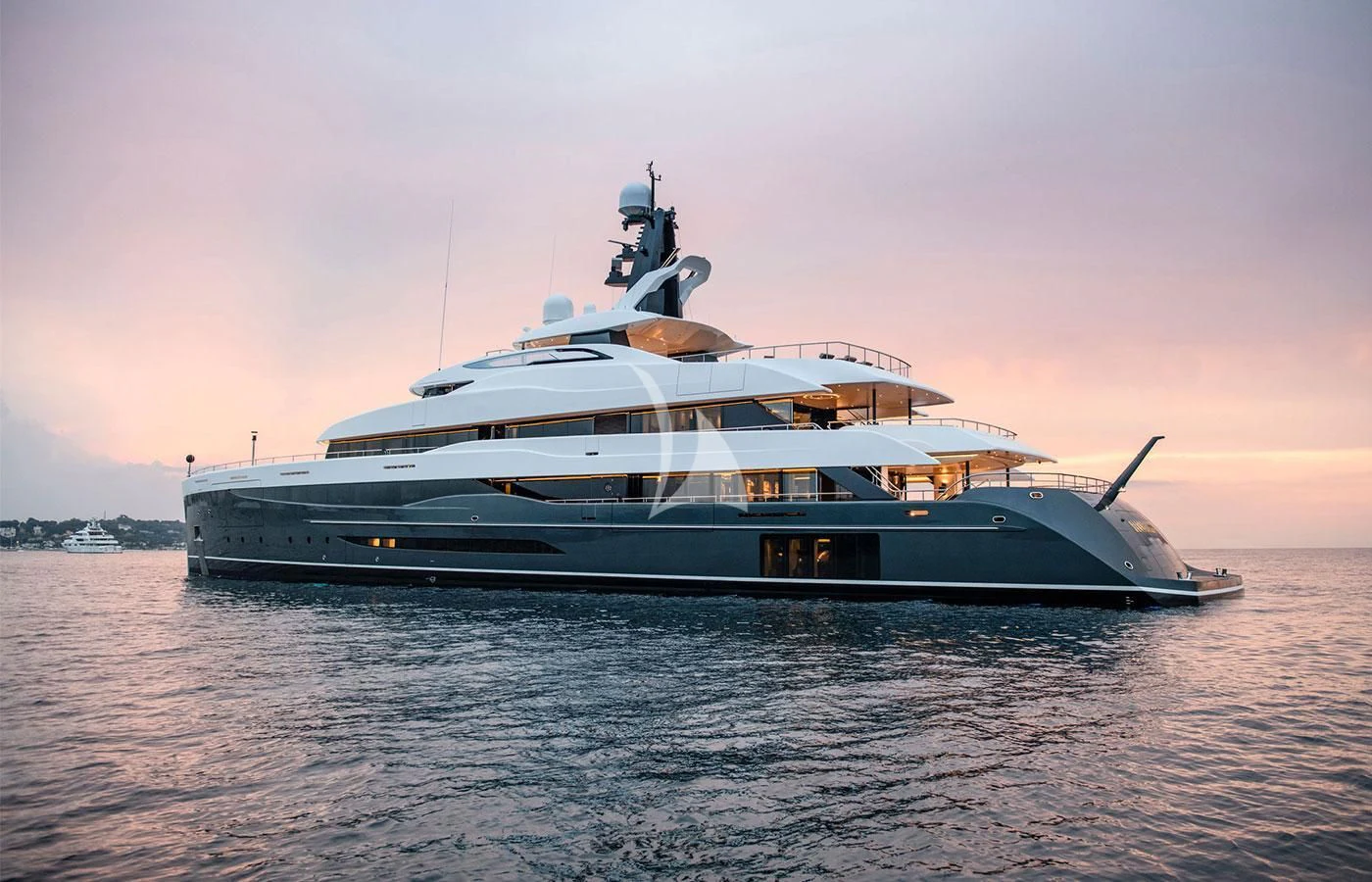 a large boat on the water aboard M'BRACE Yacht for Sale