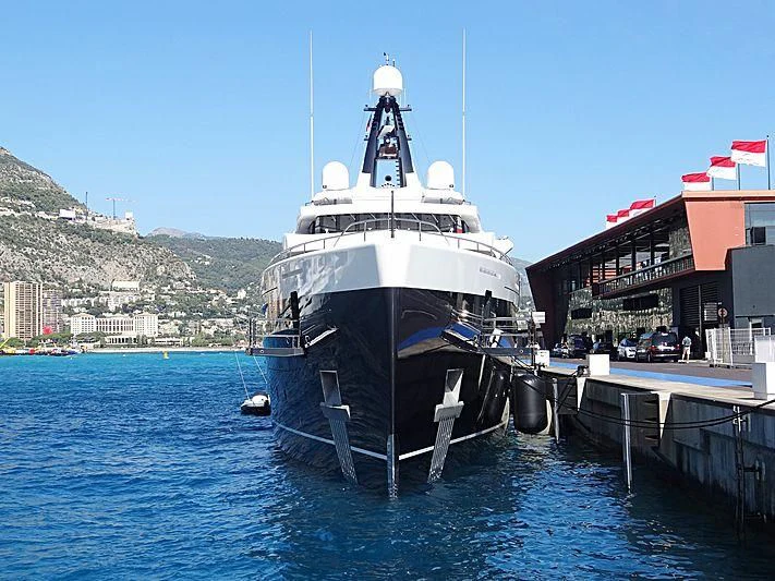 a large boat docked at a pier aboard M'BRACE Yacht for Sale