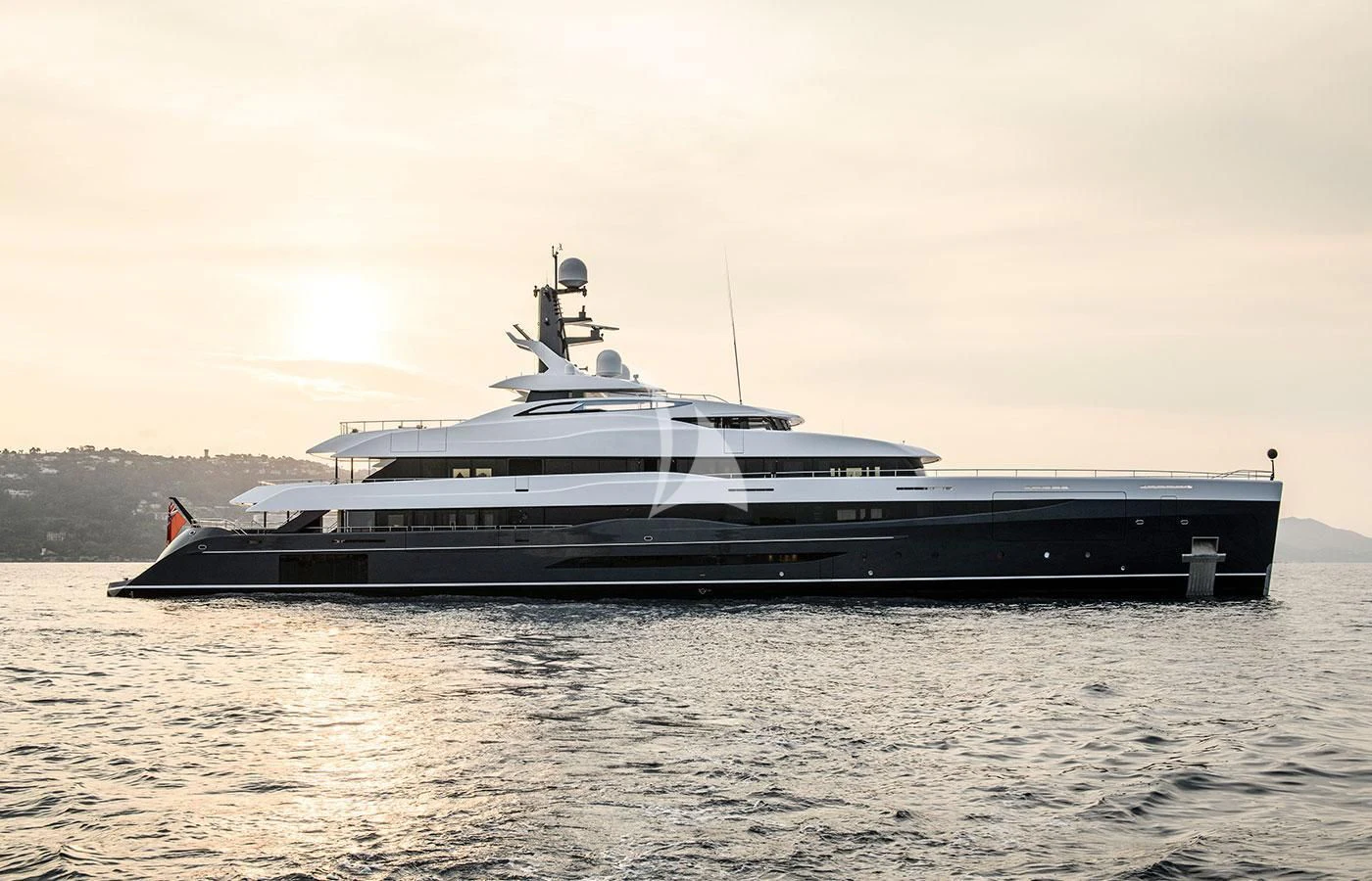 a large ship in the water aboard M'BRACE Yacht for Sale