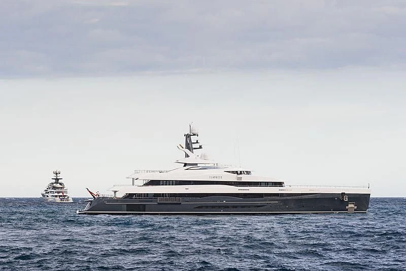 a large ship in the water aboard M'BRACE Yacht for Sale