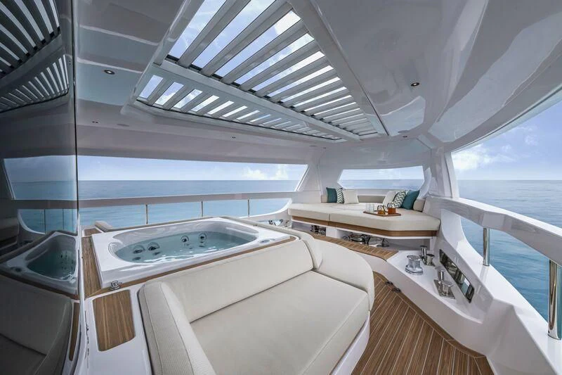 a room with a bed and a sink aboard INFYNITO 90/01 Yacht for Sale