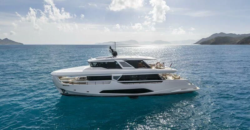 a white yacht in the water aboard INFYNITO 90/01 Yacht for Sale
