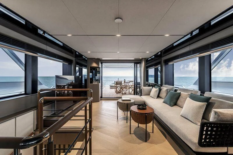 a living room with a large window aboard INFYNITO 90/01 Yacht for Sale