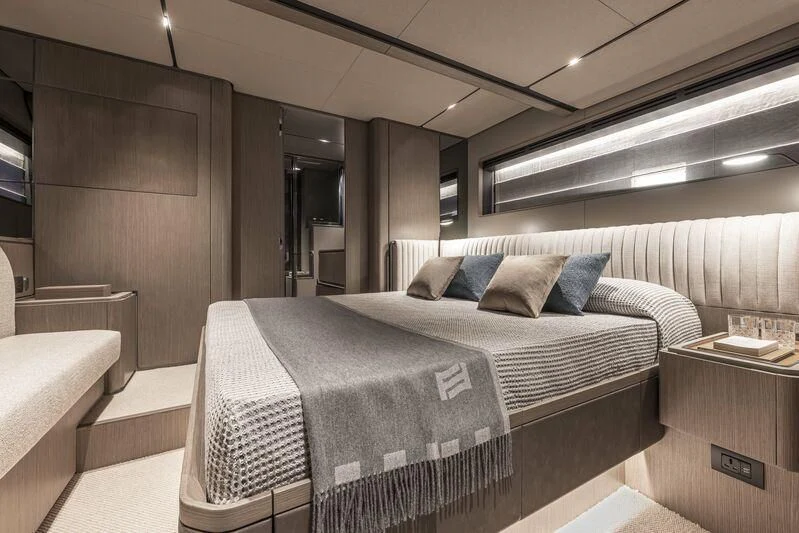 a bed in a room aboard INFYNITO 90/01 Yacht for Sale