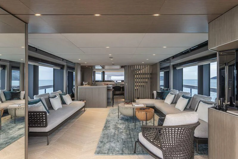 a living room with a large window aboard INFYNITO 90/01 Yacht for Sale