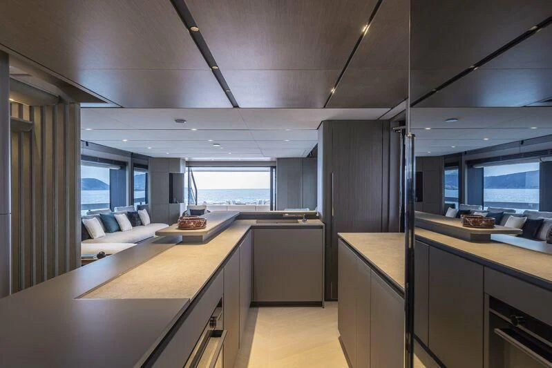a modern looking kitchen aboard INFYNITO 90/01 Yacht for Sale