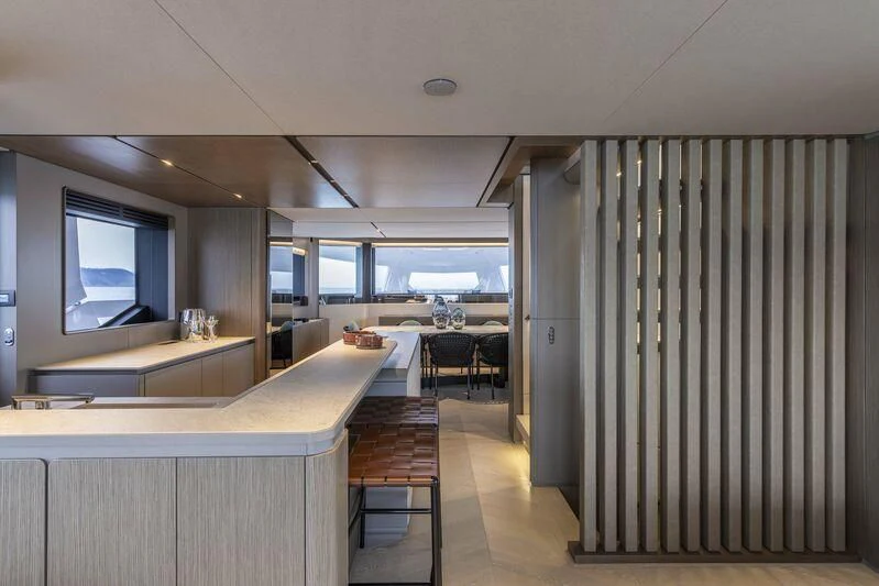 a room with a desk and a window aboard INFYNITO 90/01 Yacht for Sale