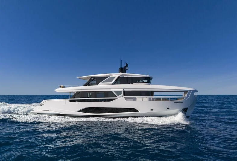 a white yacht in the water aboard INFYNITO 90/01 Yacht for Sale
