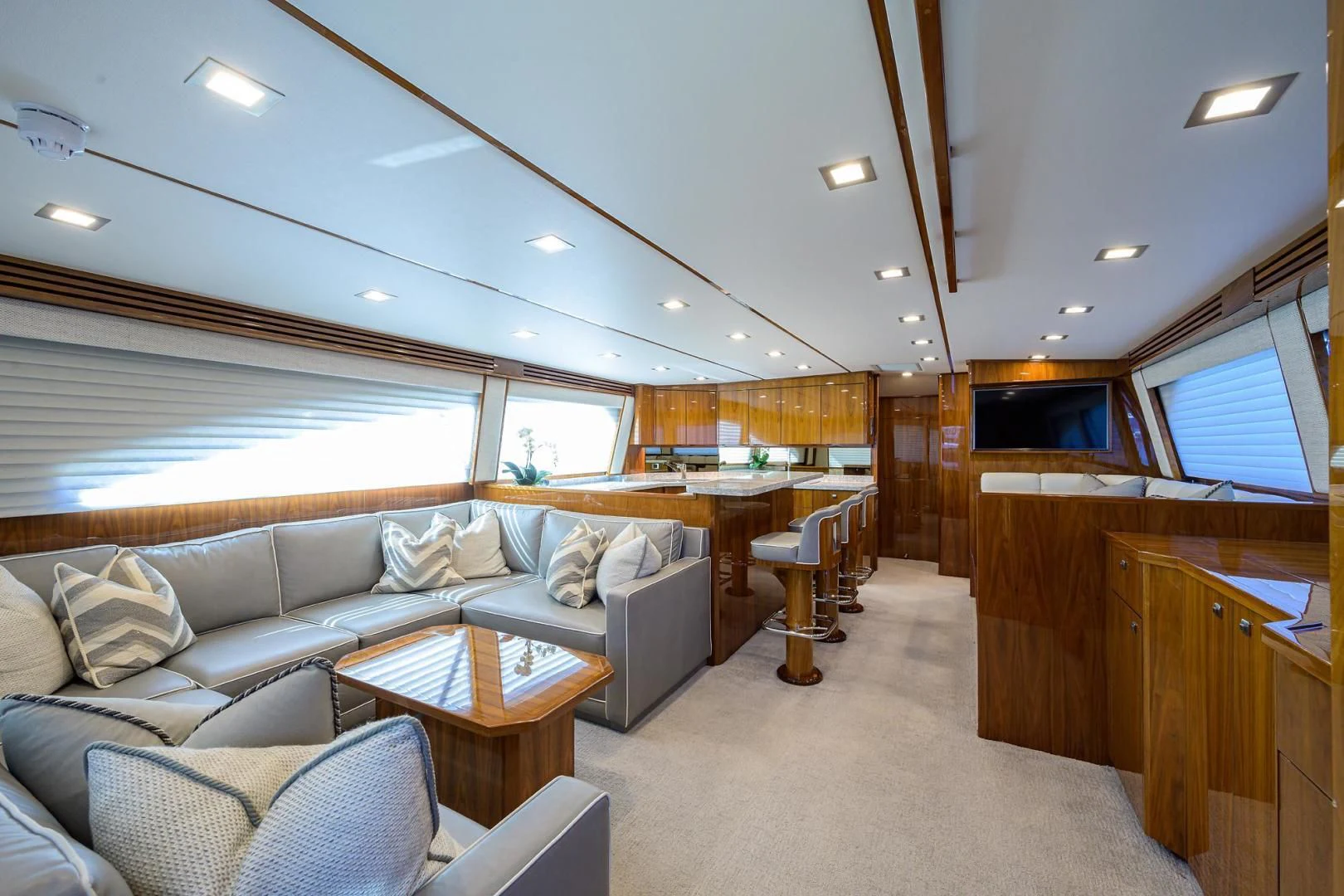a living room with a couch and a table aboard QUICK RAISE Yacht for Sale
