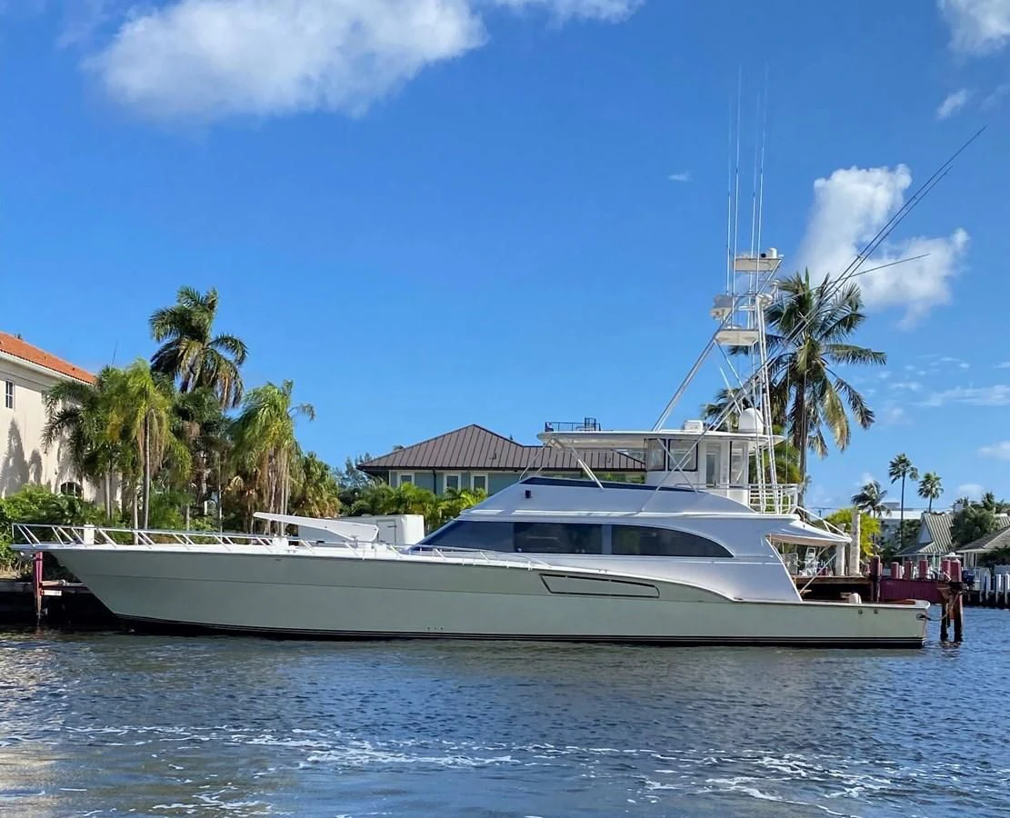 a white boat on the water aboard COURTNEY ANNE Yacht for Sale