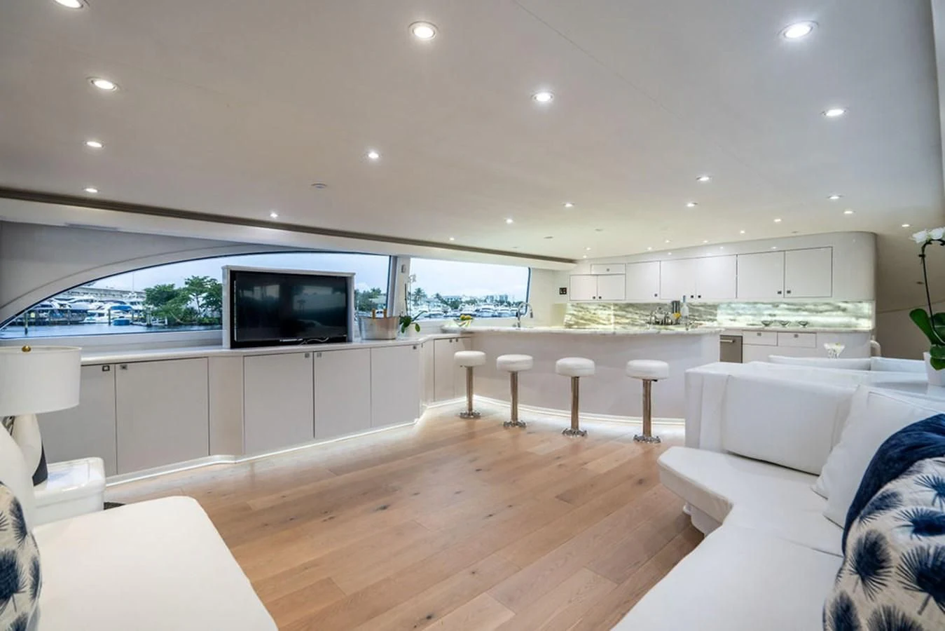 a living room with a large window aboard COURTNEY ANNE Yacht for Sale