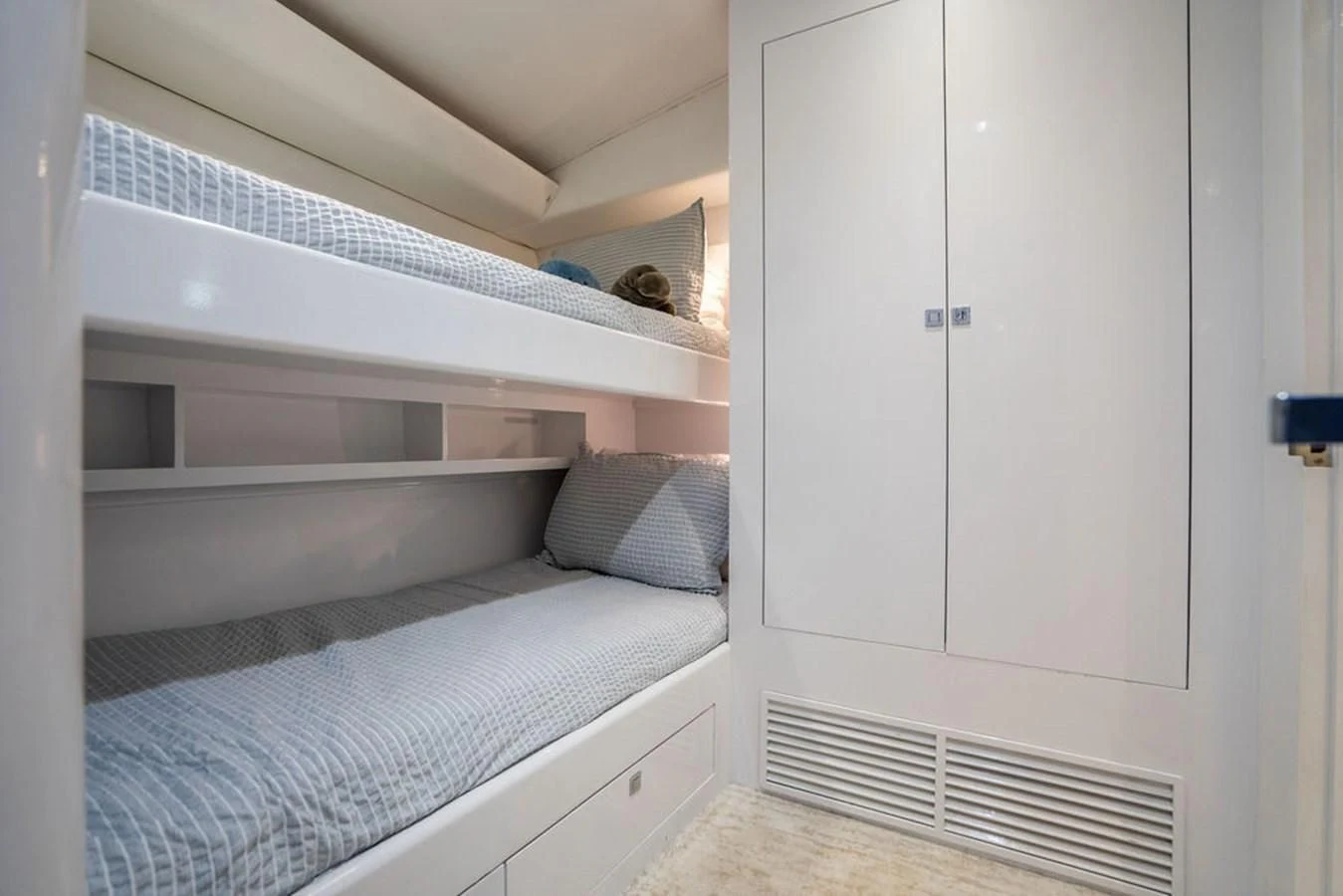 a cat lying on a bed aboard COURTNEY ANNE Yacht for Sale