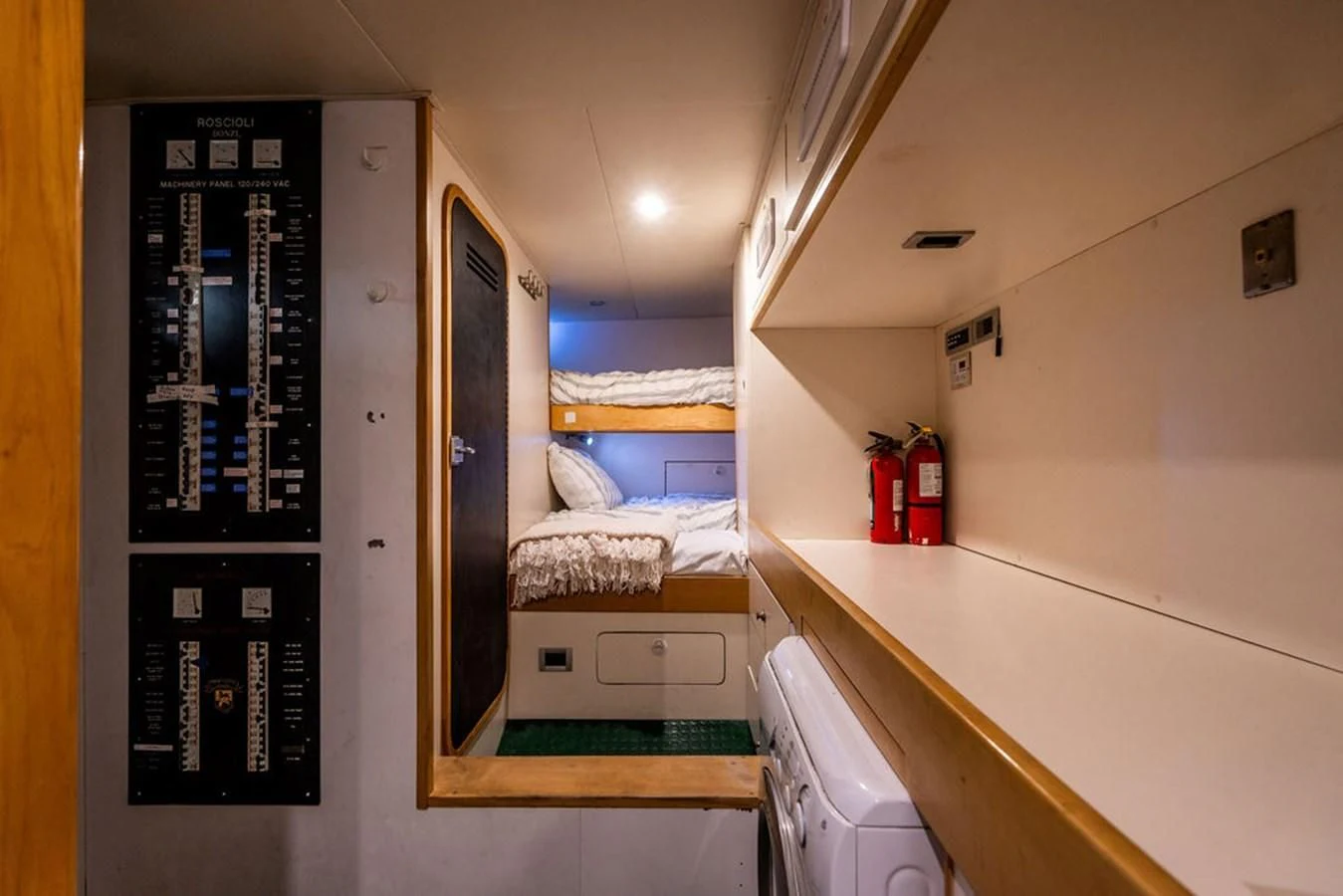 a room with a bed and a desk aboard COURTNEY ANNE Yacht for Sale