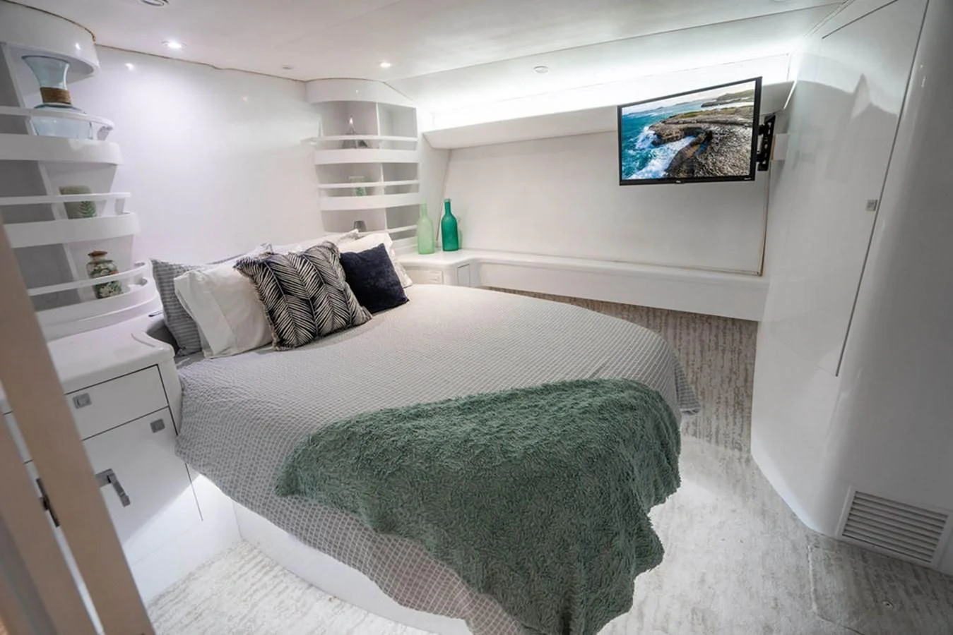 a bed in a room aboard COURTNEY ANNE Yacht for Sale
