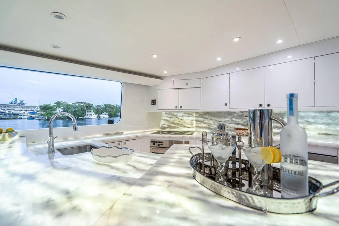 a kitchen with a sink and a large window aboard COURTNEY ANNE Yacht for Sale
