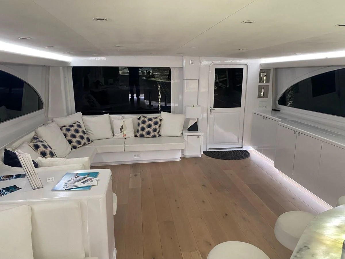 a living room with a couch and a television aboard COURTNEY ANNE Yacht for Sale