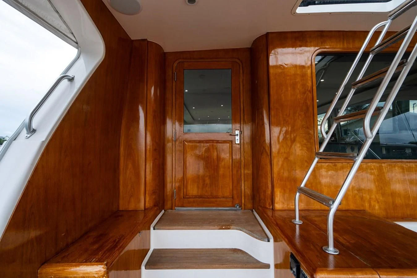 a ladder in a wooden room aboard COURTNEY ANNE Yacht for Sale
