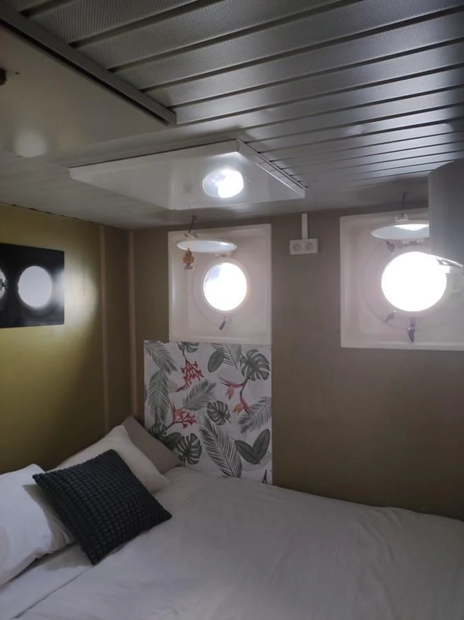 a bed with white sheets and pillows aboard TE STREEP Yacht for Sale