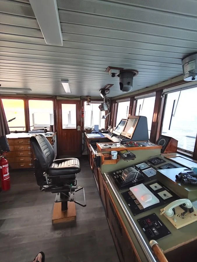 a room with a desk and computer aboard TE STREEP Yacht for Sale