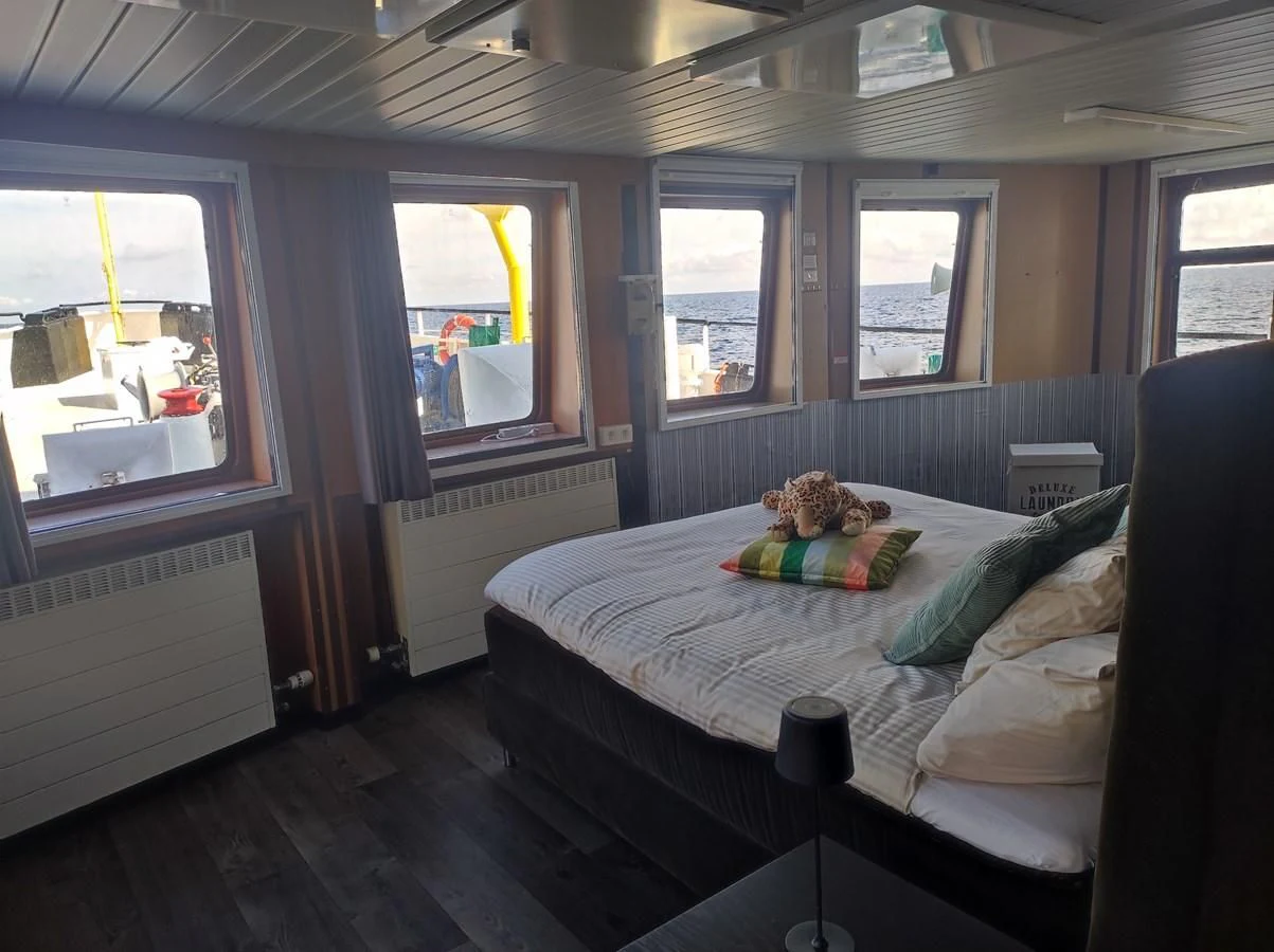 a small bedroom with a bed aboard TE STREEP Yacht for Sale