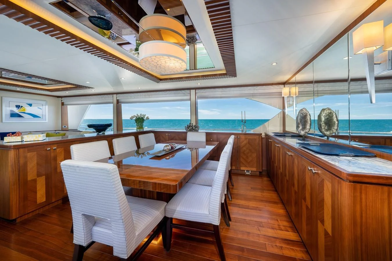 a kitchen with a dining table aboard SEA N SEA Yacht for Sale
