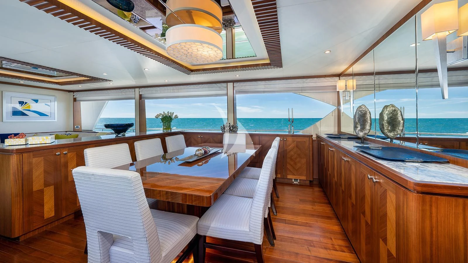 a kitchen with a dining table aboard SEA N SEA Yacht for Sale