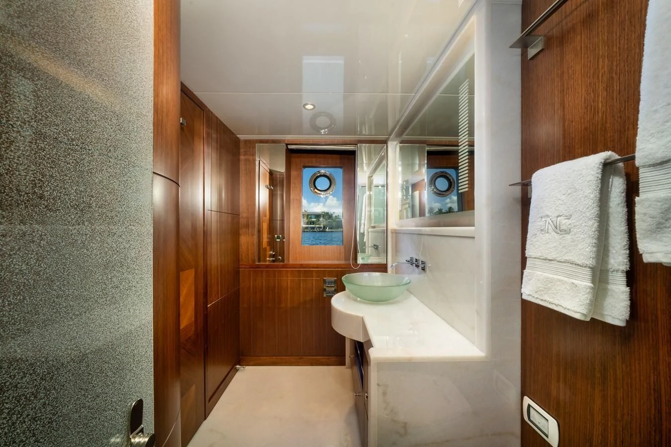 a bathroom with a sink and a mirror aboard SEA N SEA Yacht for Sale