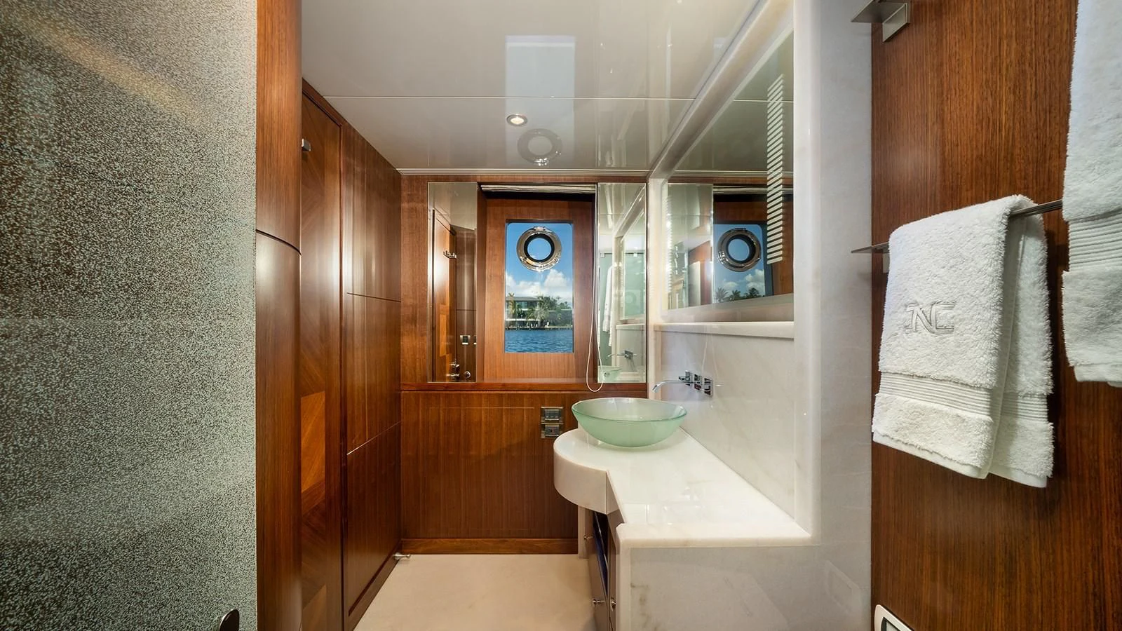 a bathroom with a sink and mirror aboard SEA N SEA Yacht for Sale