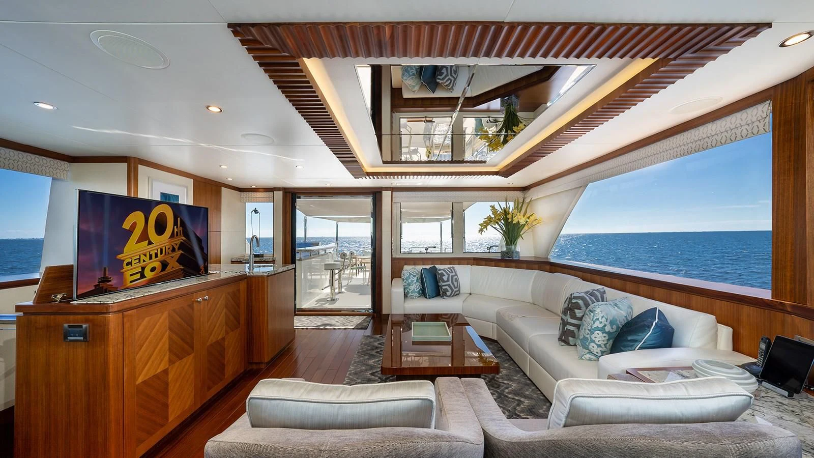 a living room with a large window aboard SEA N SEA Yacht for Sale