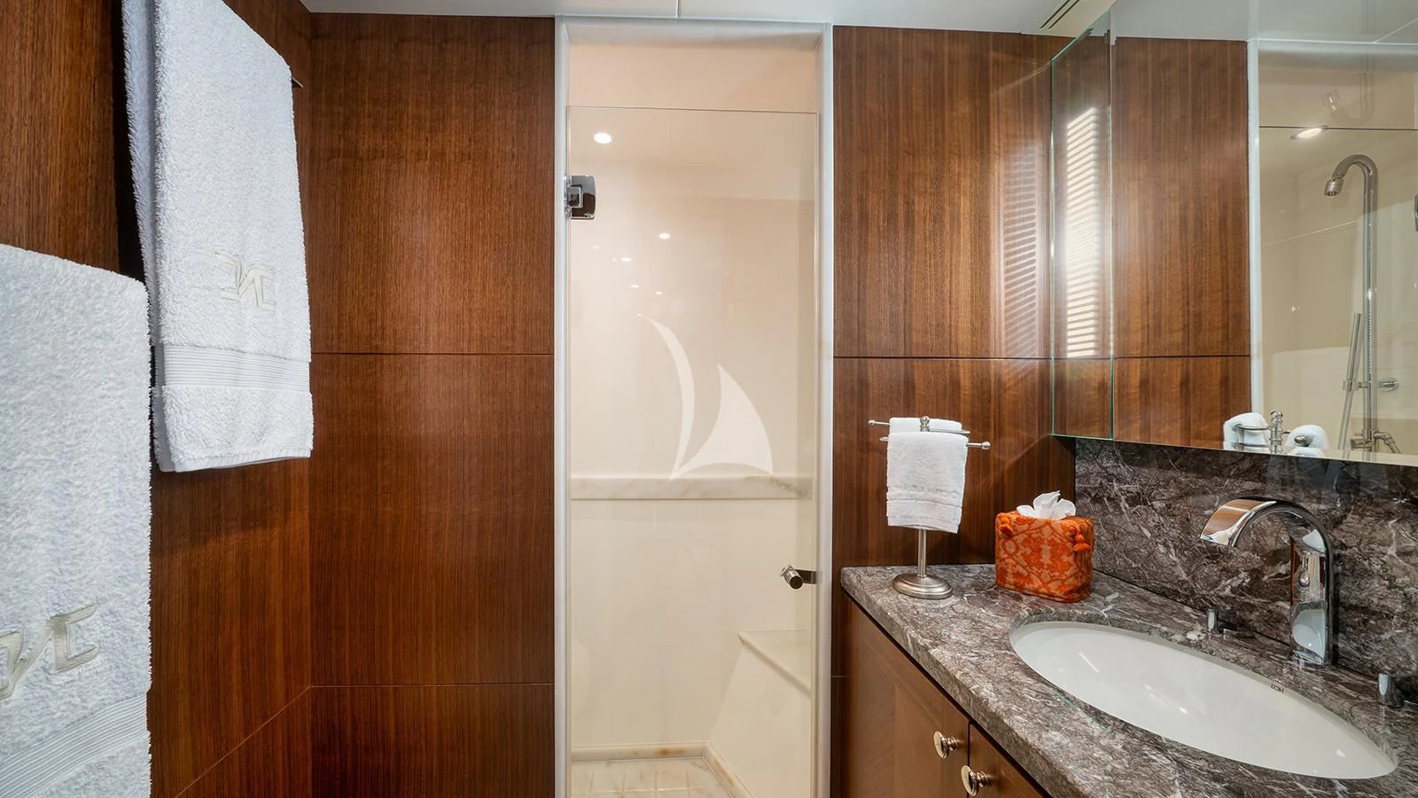a bathroom with a sink and a mirror aboard SEA N SEA Yacht for Sale