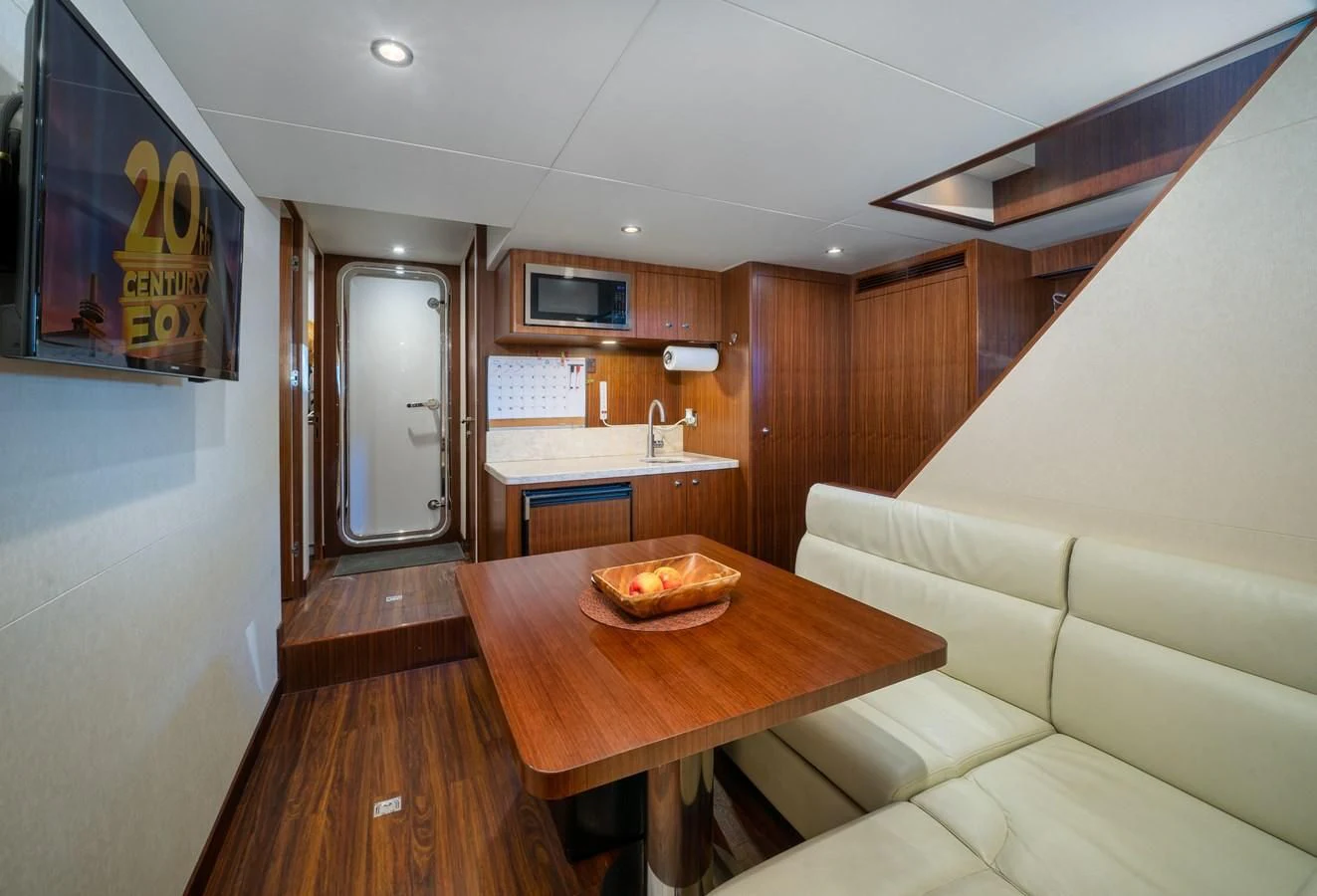 a kitchen and dining area aboard SEA N SEA Yacht for Sale