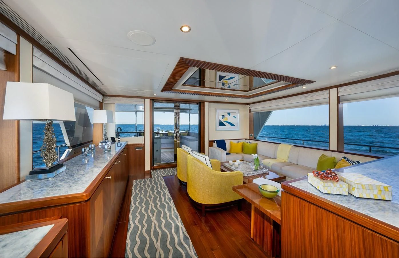 a room with a view of the ocean and the deck aboard SEA N SEA Yacht for Sale
