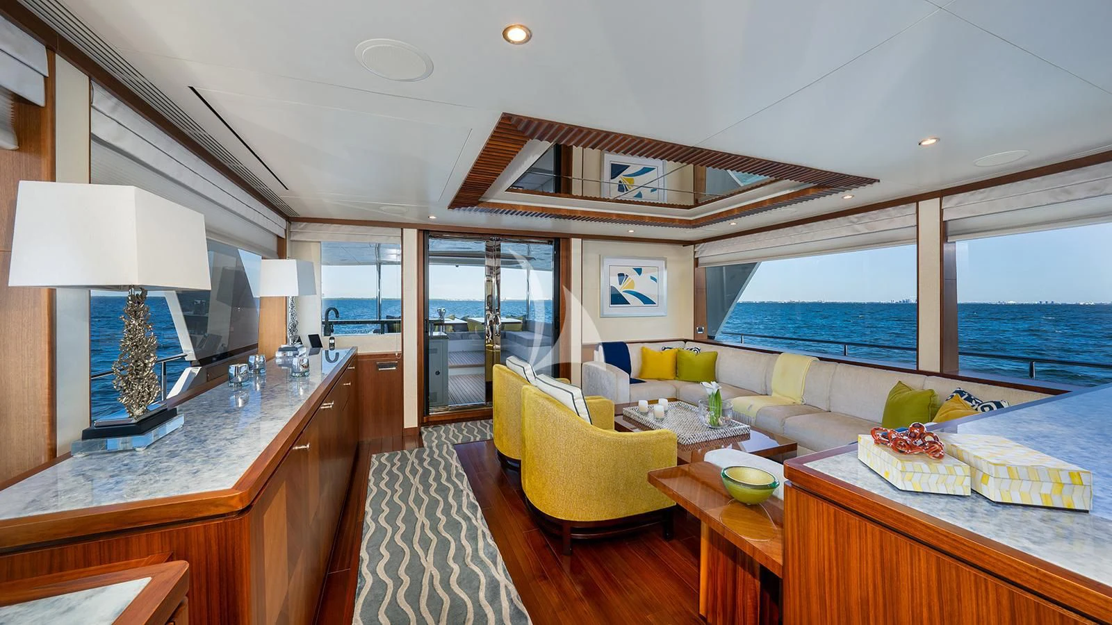 a living room with a large open window aboard SEA N SEA Yacht for Sale