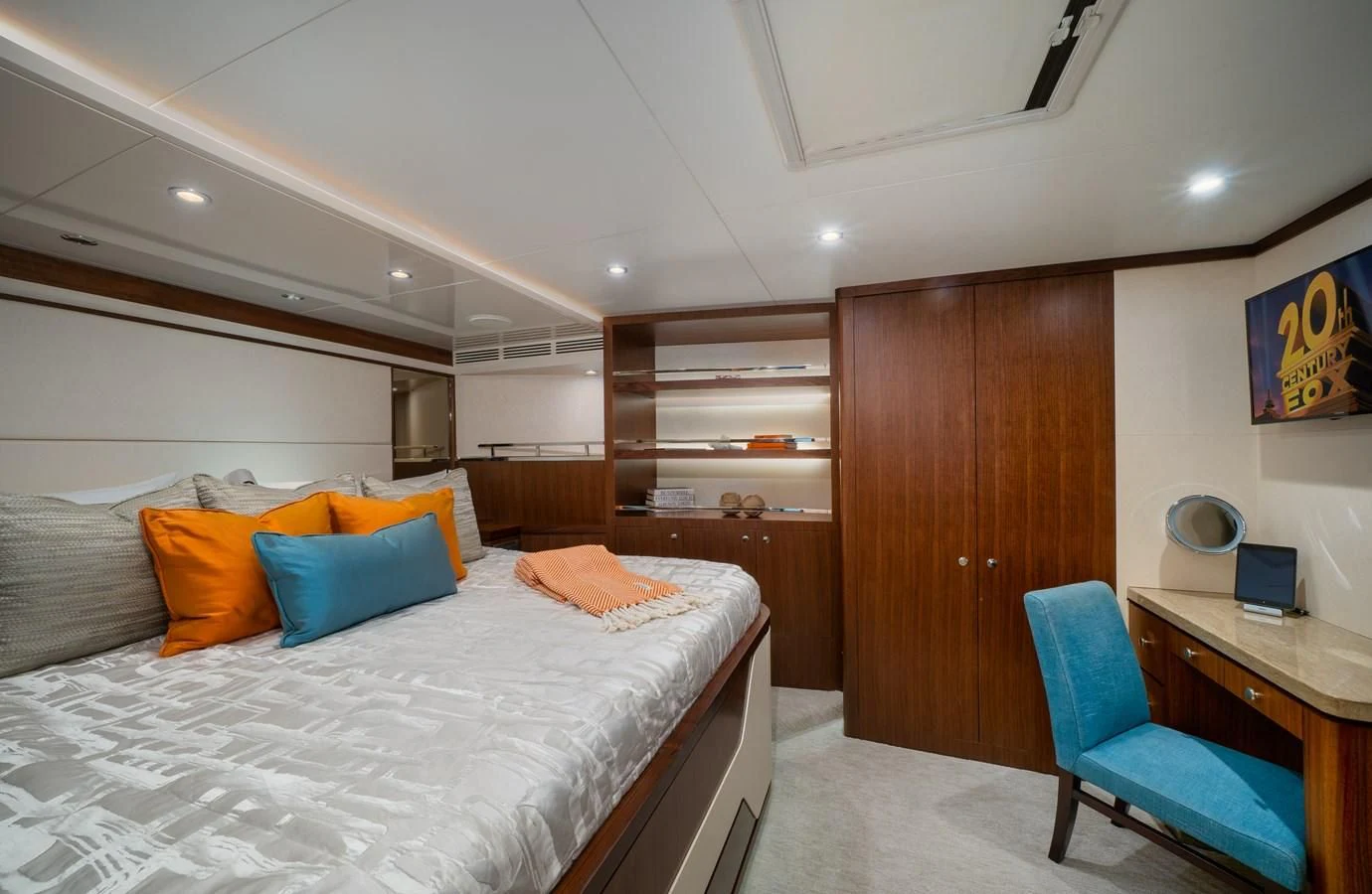 a bedroom with a bed and desk aboard SEA N SEA Yacht for Sale