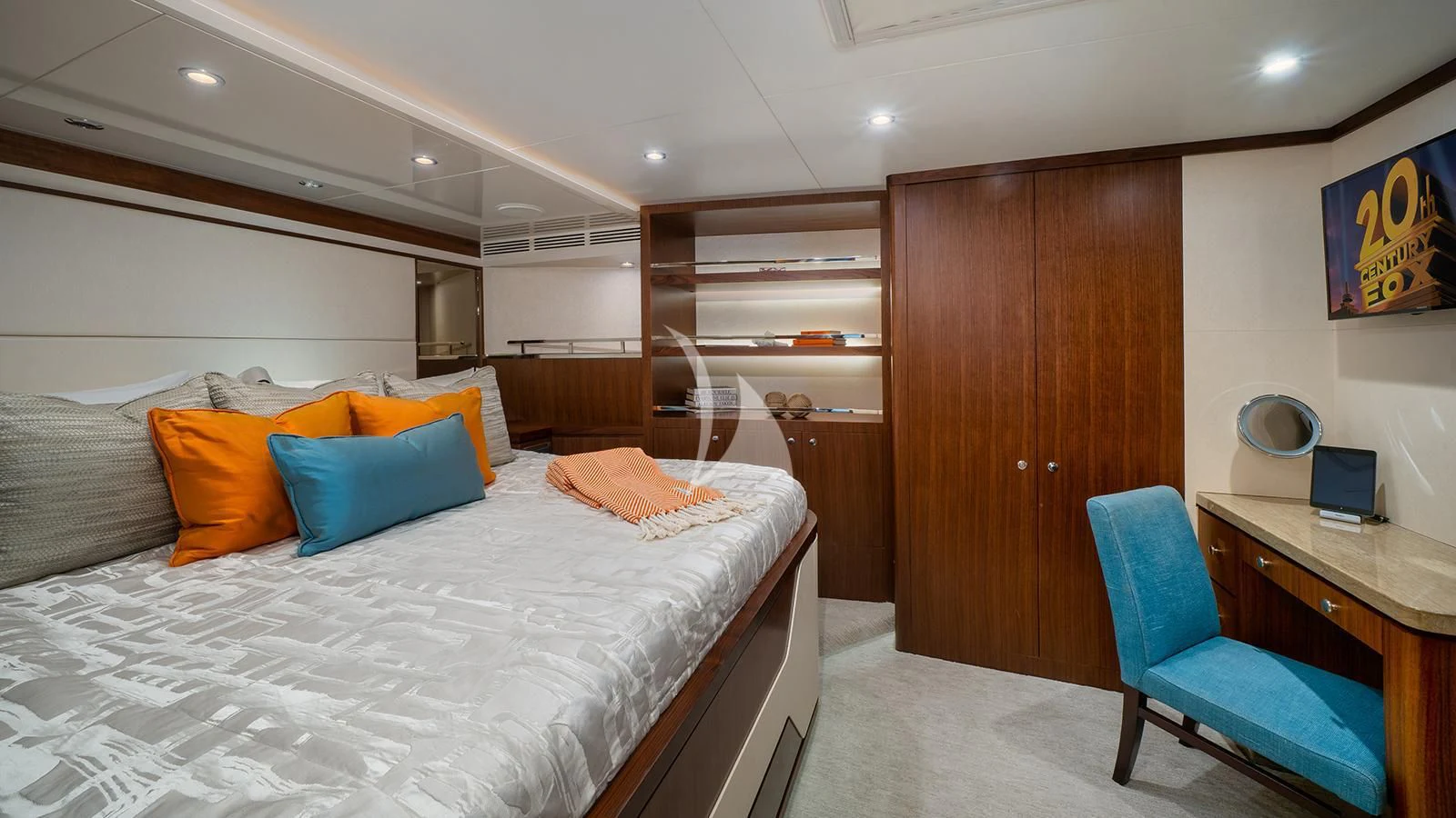 a bedroom with a bed and desk aboard SEA N SEA Yacht for Sale