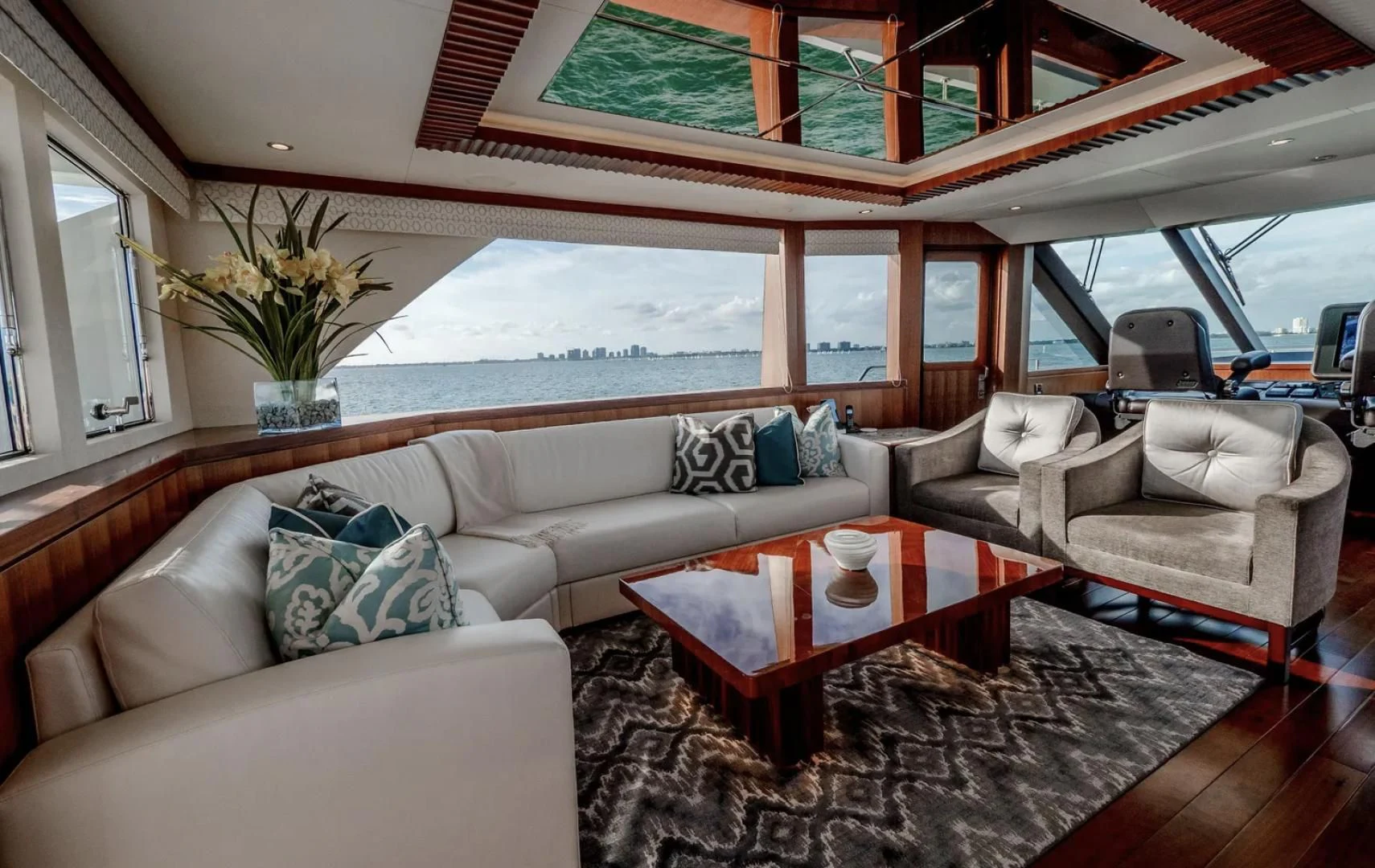a living room with a large window aboard SEA N SEA Yacht for Sale