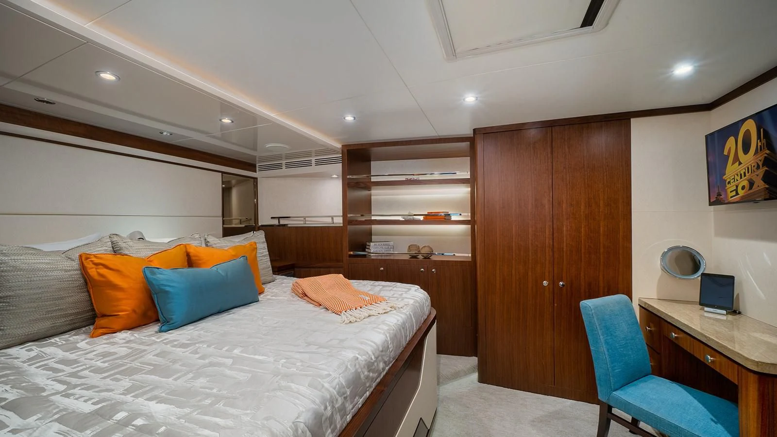 a bedroom with a bed and desk aboard SEA N SEA Yacht for Sale