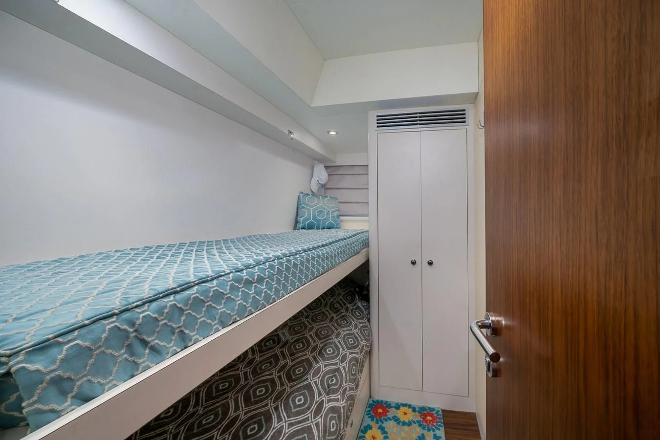 a bed in a room aboard SEA N SEA Yacht for Sale