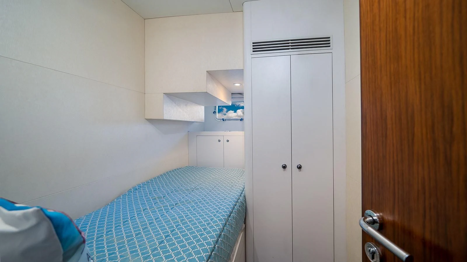 a bed in a room aboard SEA N SEA Yacht for Sale
