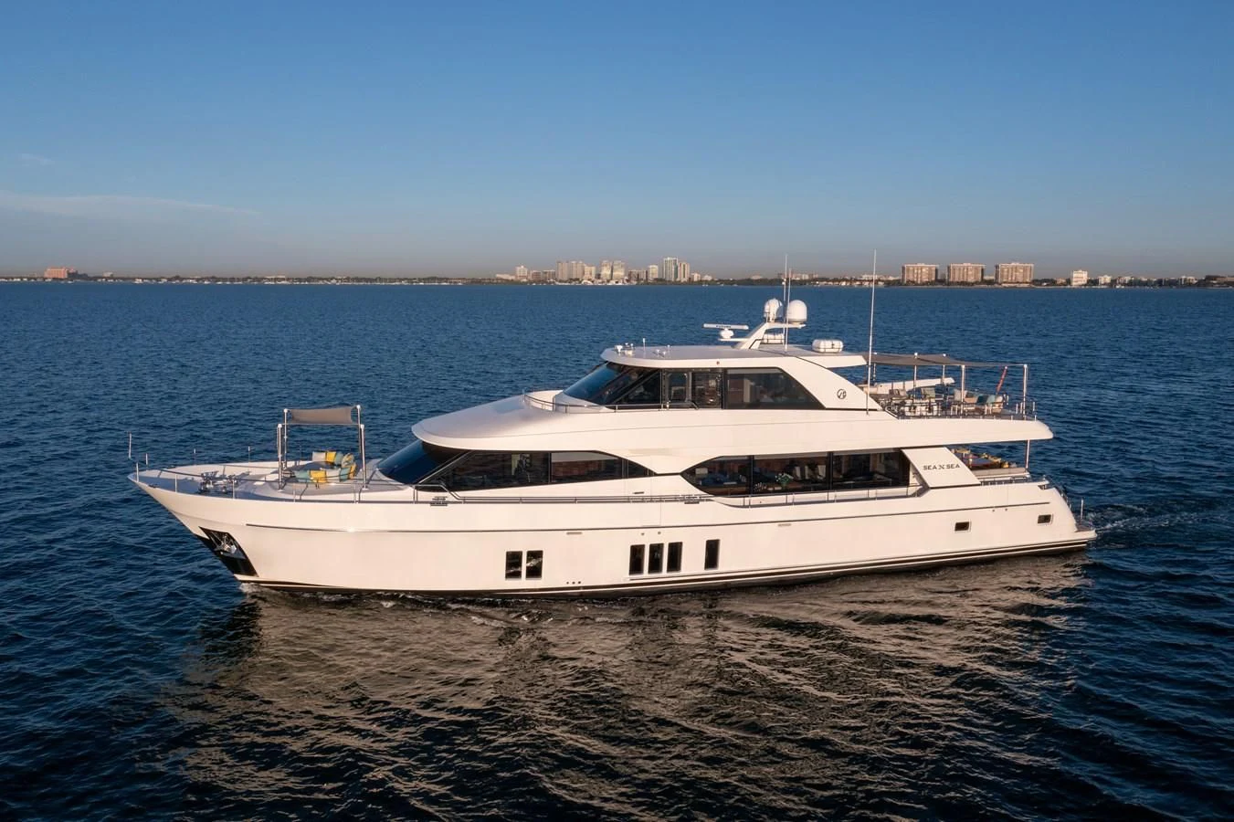 a white yacht on the water aboard SEA N SEA Yacht for Sale