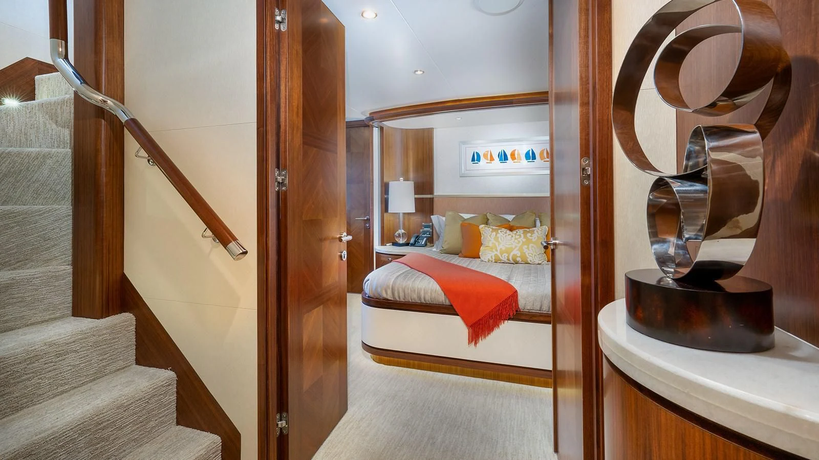 a room with a bed and a mirror aboard SEA N SEA Yacht for Sale