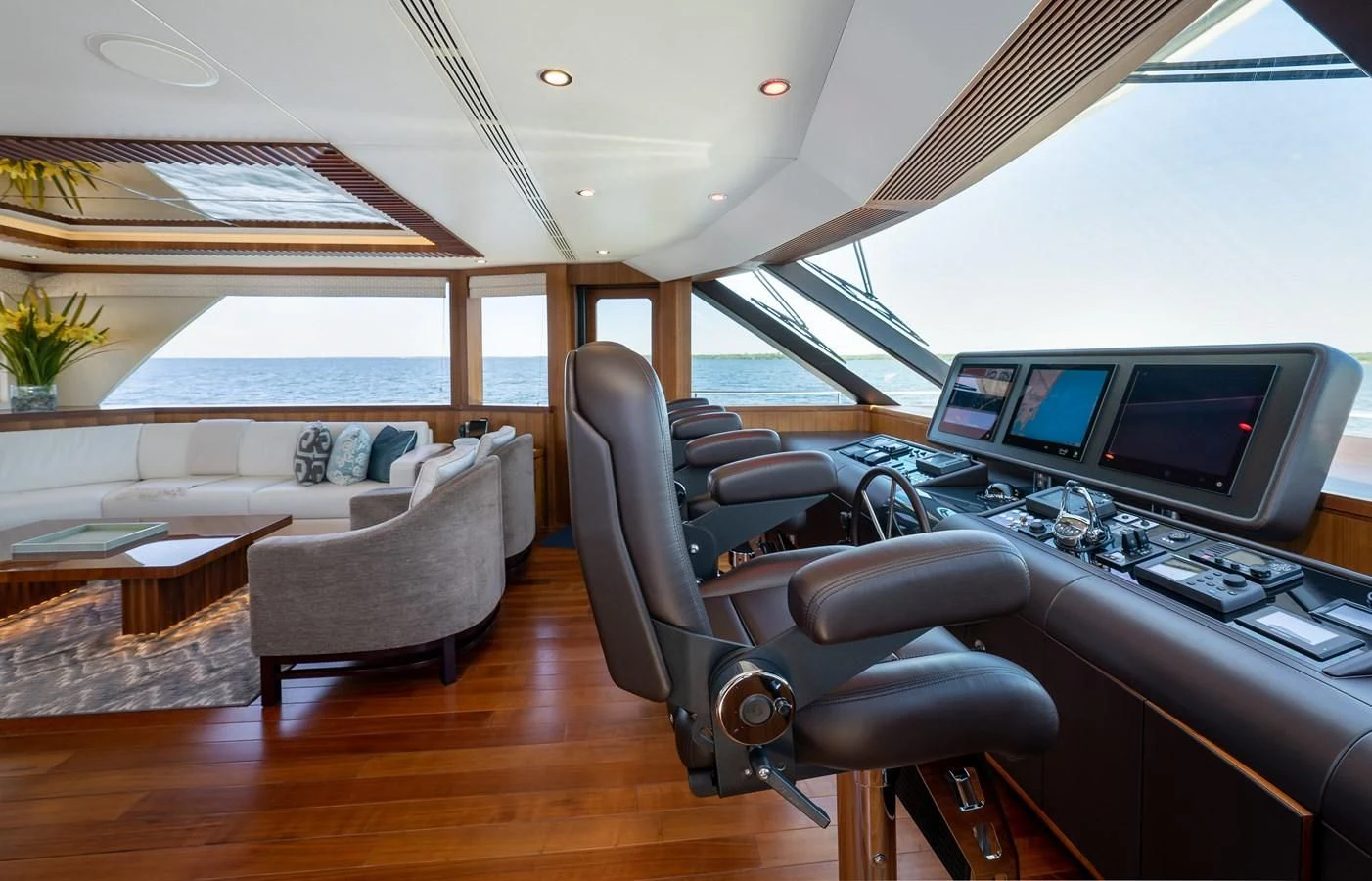 a room with a desk and a bed and a computer aboard SEA N SEA Yacht for Sale
