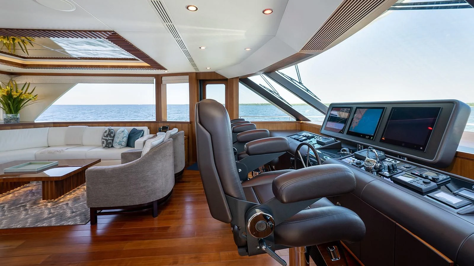 a living room with a large window aboard SEA N SEA Yacht for Sale