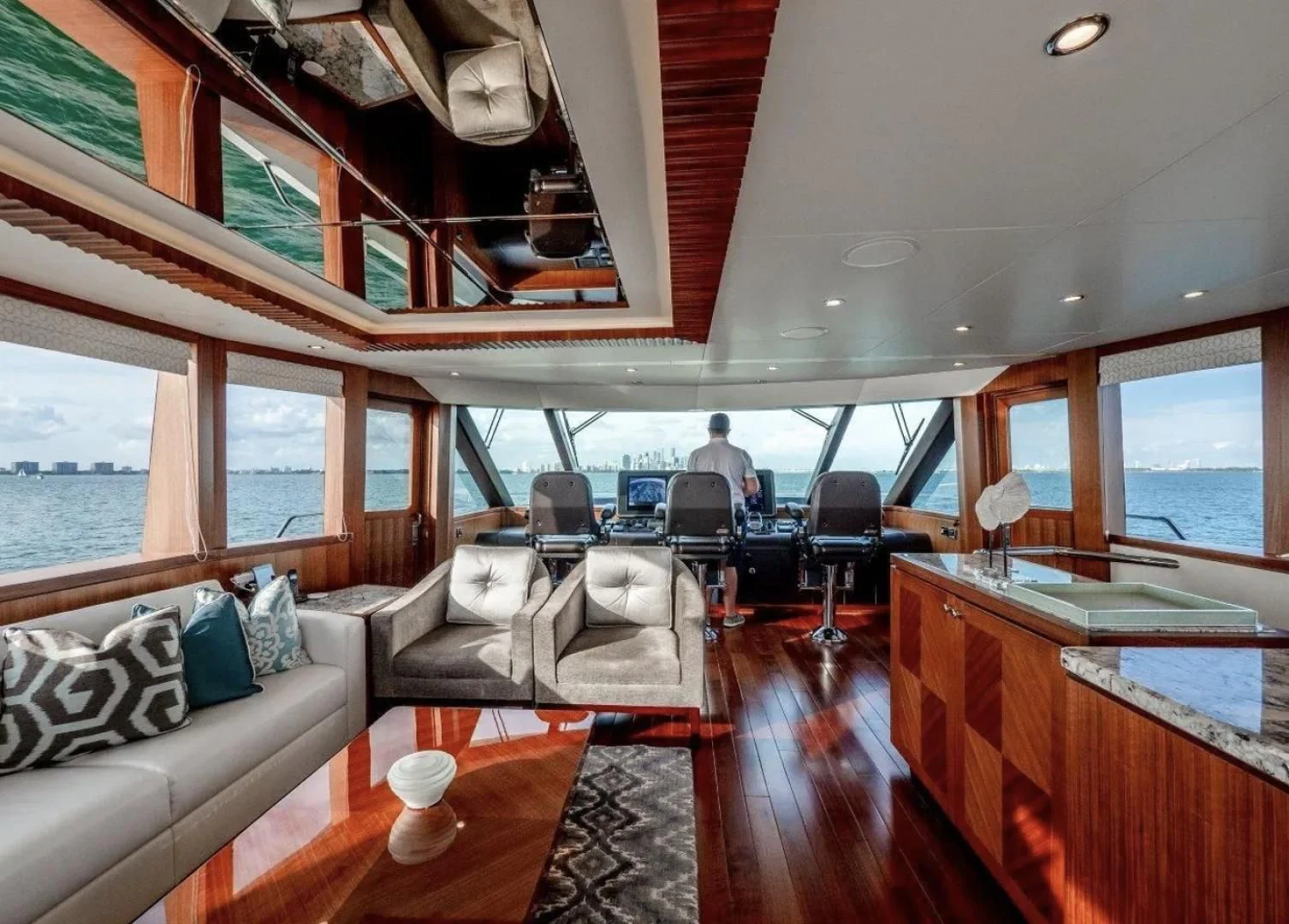 a room with a wood floor and a large window with a wood floor aboard SEA N SEA Yacht for Sale