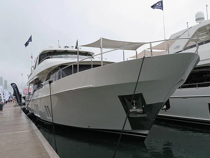 a white boat on a dock aboard SEA N SEA Yacht for Sale
