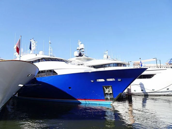 a large blue and white boat aboard ADVENTURER Yacht for Sale