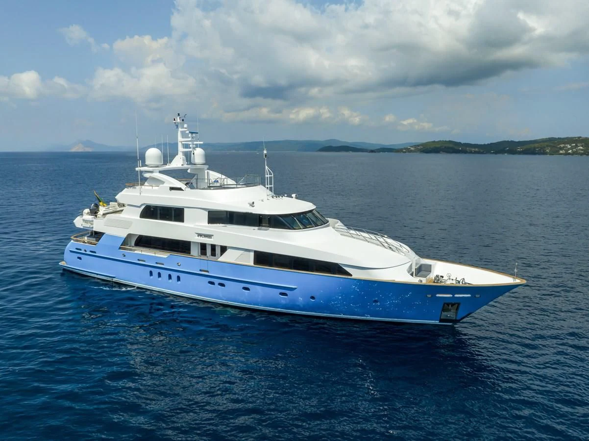 a white yacht in the water aboard ADVENTURER Yacht for Sale