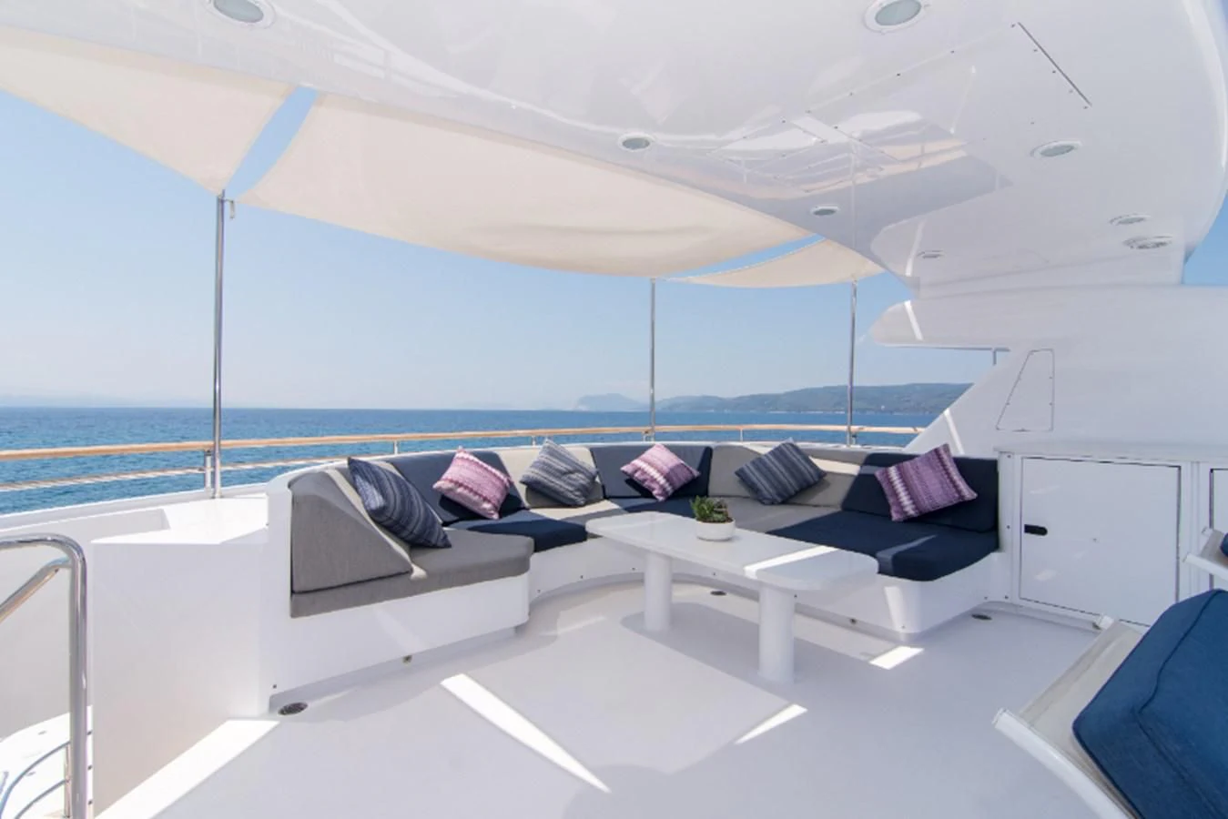 a room with a large window overlooking the ocean aboard ADVENTURER Yacht for Sale